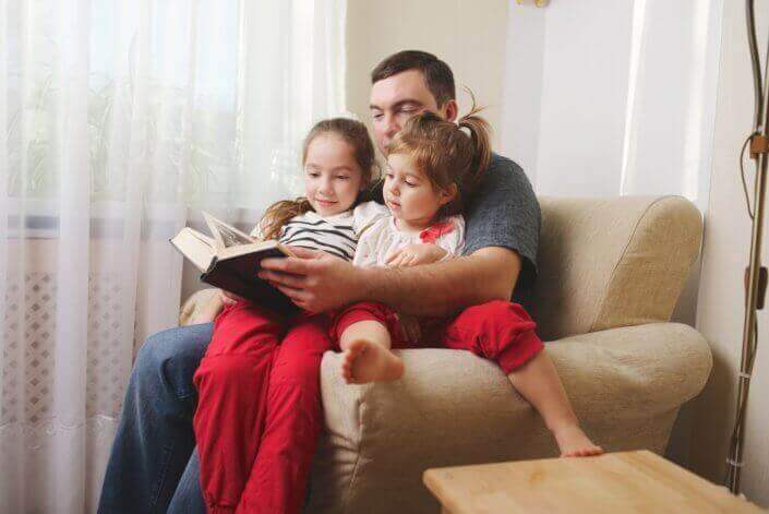photo of father with daughter at home